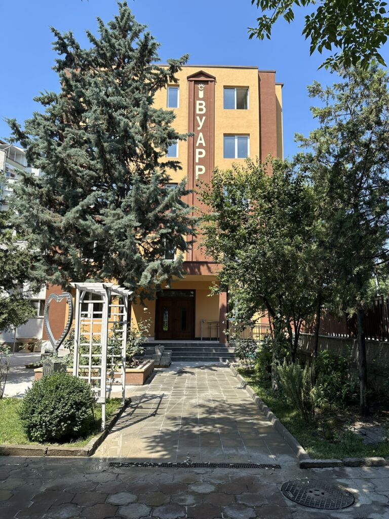 A building with trees in front of it